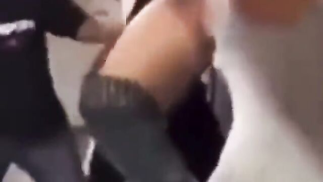 Man gets punched in the ass while fighting in public - 2 image