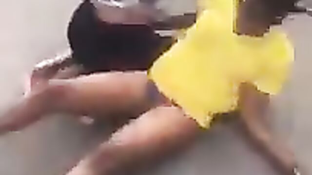 African girls showing pussy and panties while engaging in public street fight - 3 image