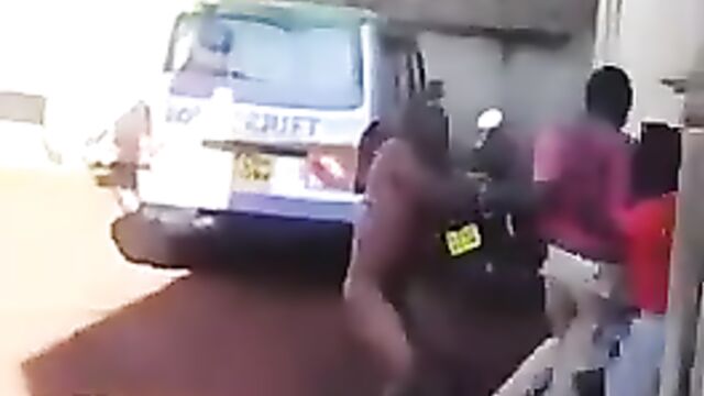 Angry Boyfriend fights naked man after he caught his girlfriend cheating - 1 image