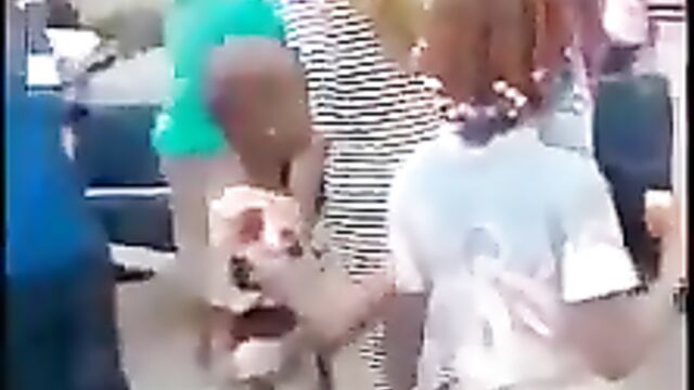 Boobs exposed as ‘ashawo’ fights nursing mother over a man in public - 1 image