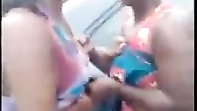 Boobs exposed as ‘ashawo’ fights nursing mother over a man in public