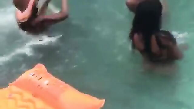 Naked girls wilding, showing breasts at a public pool party – Part 1 - 1 image