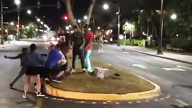 Girl fighting in public, exposing her naked ass