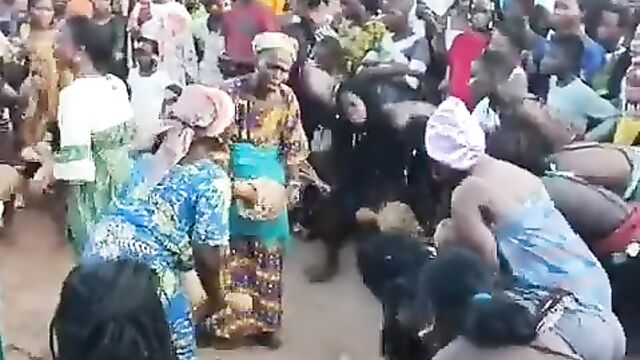 Big breasts pop out in public during African cultural event - 1 image