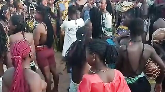 Big breasts pop out in public during African cultural event