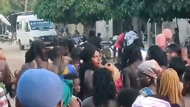 Big breasts pop out in public during African cultural event - 3 image