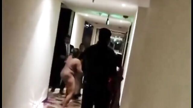 Mature African Woman With Big Breasts Strips Naked And Runs Mad In A Hotel In Public - 1 image