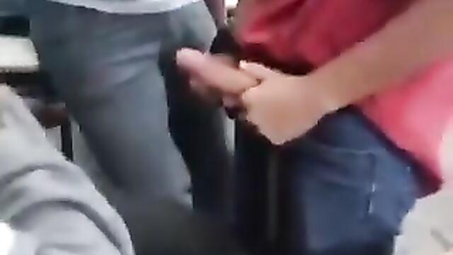 Cute School girl giving threesome head in class - 1 image